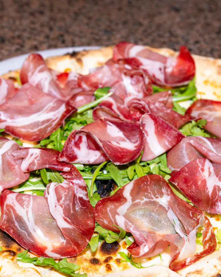 Rustica pizza with San Daniele prosciutto and rocket
